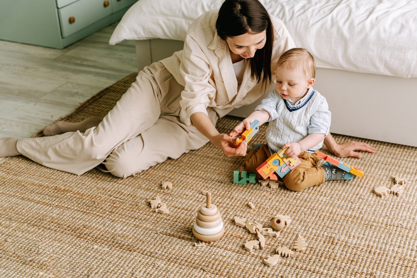 A Baby Playing Wooden Toys