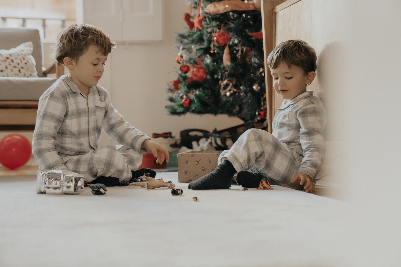 Brothers opening Christmas gifts
